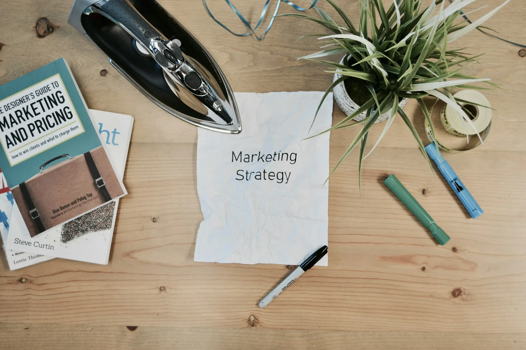Marketing strategy notes and pens on a desk